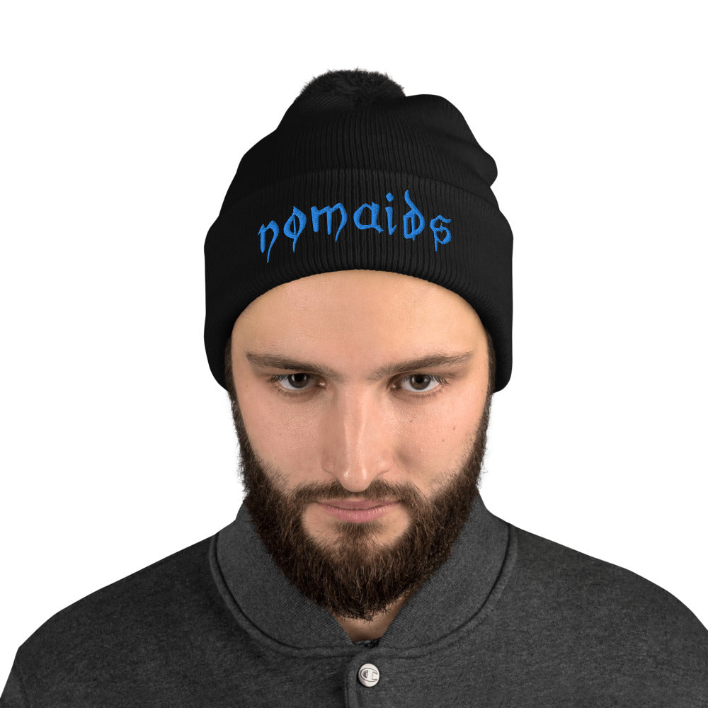 blue straight nomaide logo Pom-Pom Beanie